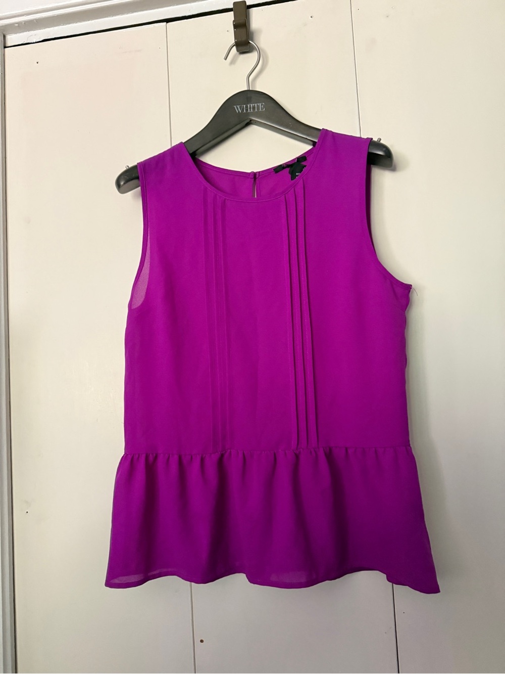 Sleeveless Peplum Blouse in Fuchsia